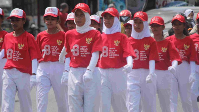 Ribuan Warga Mimika Tumpah Ruah Ke Jalan-Jalan Utama Saksikan Lomba Gerak Jalan Dalam Rangka HUT RI ke 78
