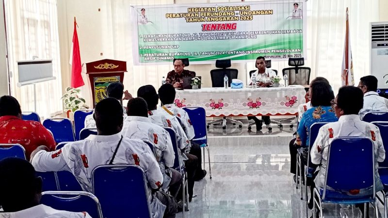 Paradefoto Kegiatan Sosialisasi Tiga Regulasi Strategis untuk Penguatan Tata Kelola Pemerintahan Kampung di Distrik Miktim