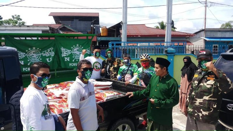 Dampak Pendemik Covid-19, PC NU Mimika Berbagi Kasih Sembako dan Masker